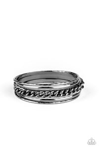 A Piece Of The Action Black Bracelet- Paparazzi