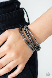 A Piece Of The Action Black Bracelet- Paparazzi